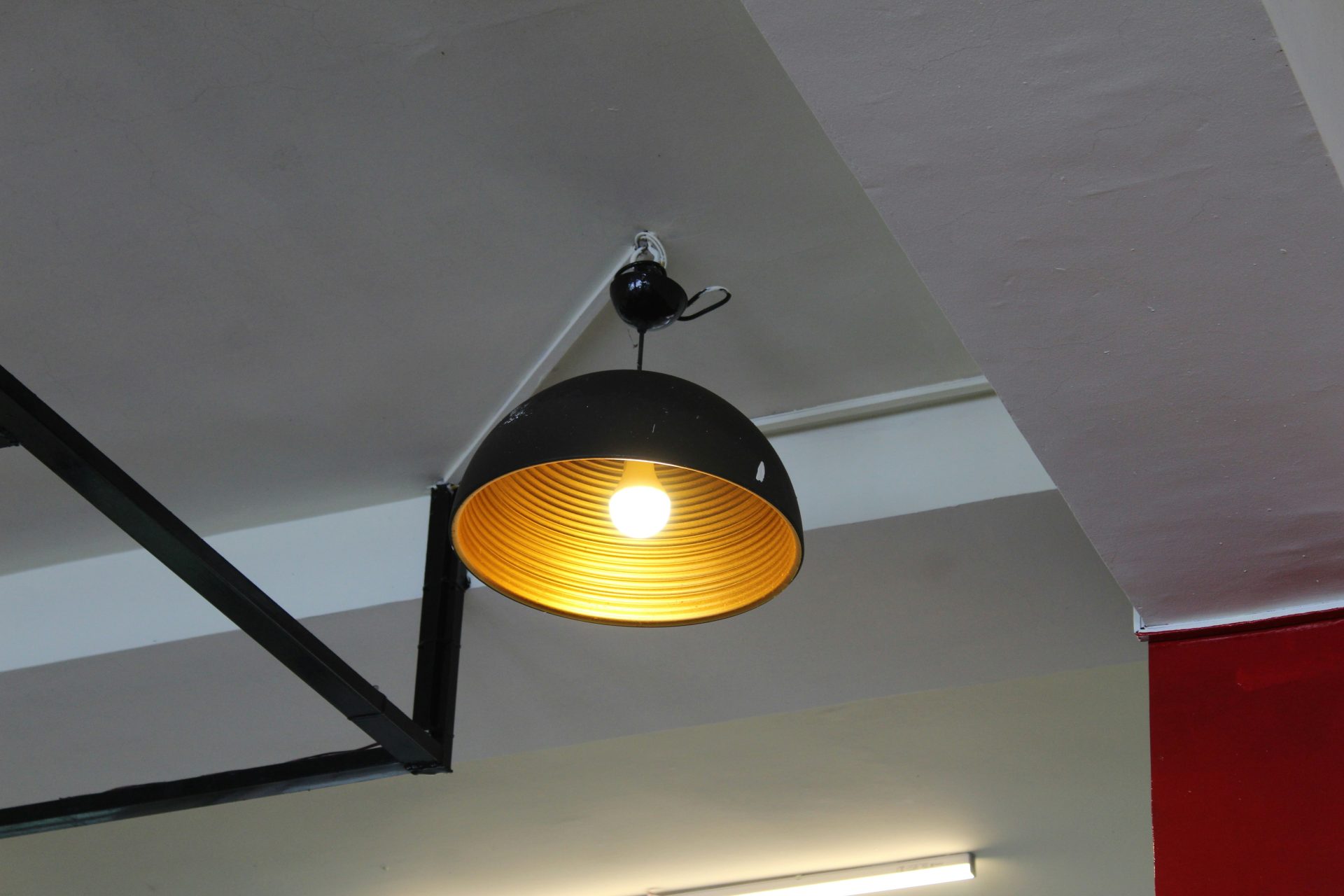 a light fixture from a ceiling